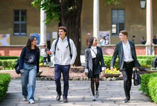 Students stroll through the university courtyard.