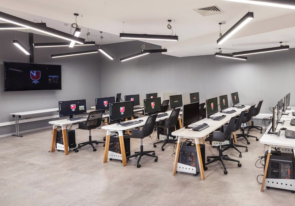A university classroom at the University of Nicosia, featuring computers.